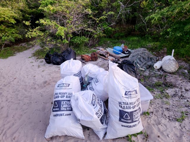 Photo of some of the more than 100kg of rubbish the team cleared from the beach.