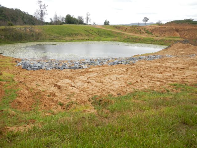 Photo of the excavation pit where a man was fined for not implementing a scour protection plan to prevent scouring of the banks.